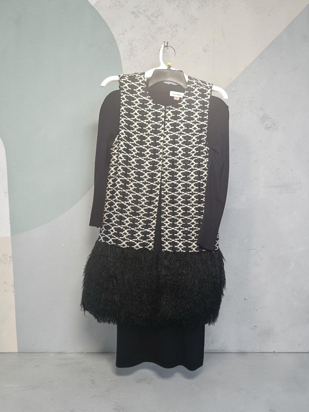 Sweater dress and vest ensemble